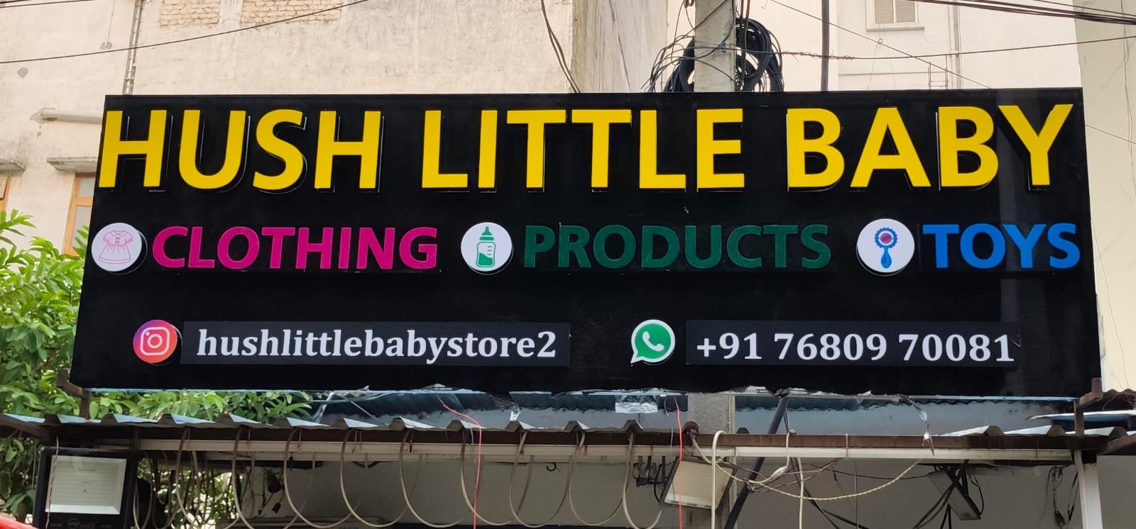 Hush Little Baby multi-colour storefront signboard